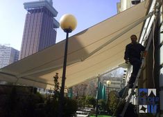 Guadalajara Ventanas instalación de toldo con brazo invisible
